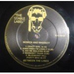 Between The Lines (13) - Woman And Whiskey (LP)