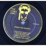Between The Lines (13) - Woman And Whiskey (LP)