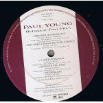 Paul Young - Between Two Fires (LP, Album)